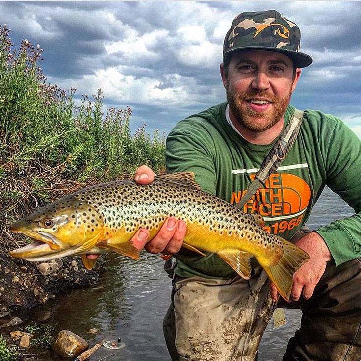 Showing off a nice late summer Brown Trout.